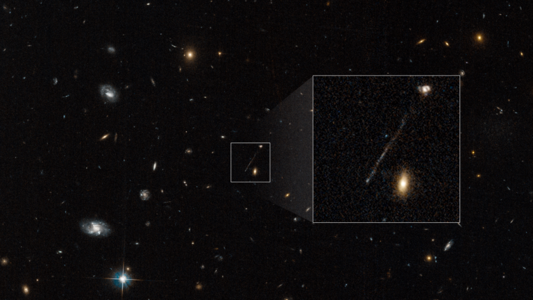 buco nero con una coda di stelle