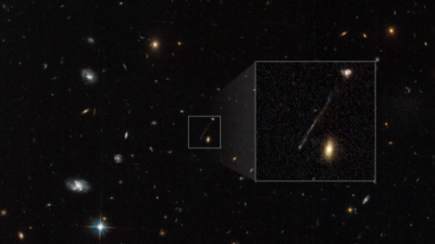 buco nero con una coda di stelle
